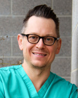 Dr. Nicholas Brewer