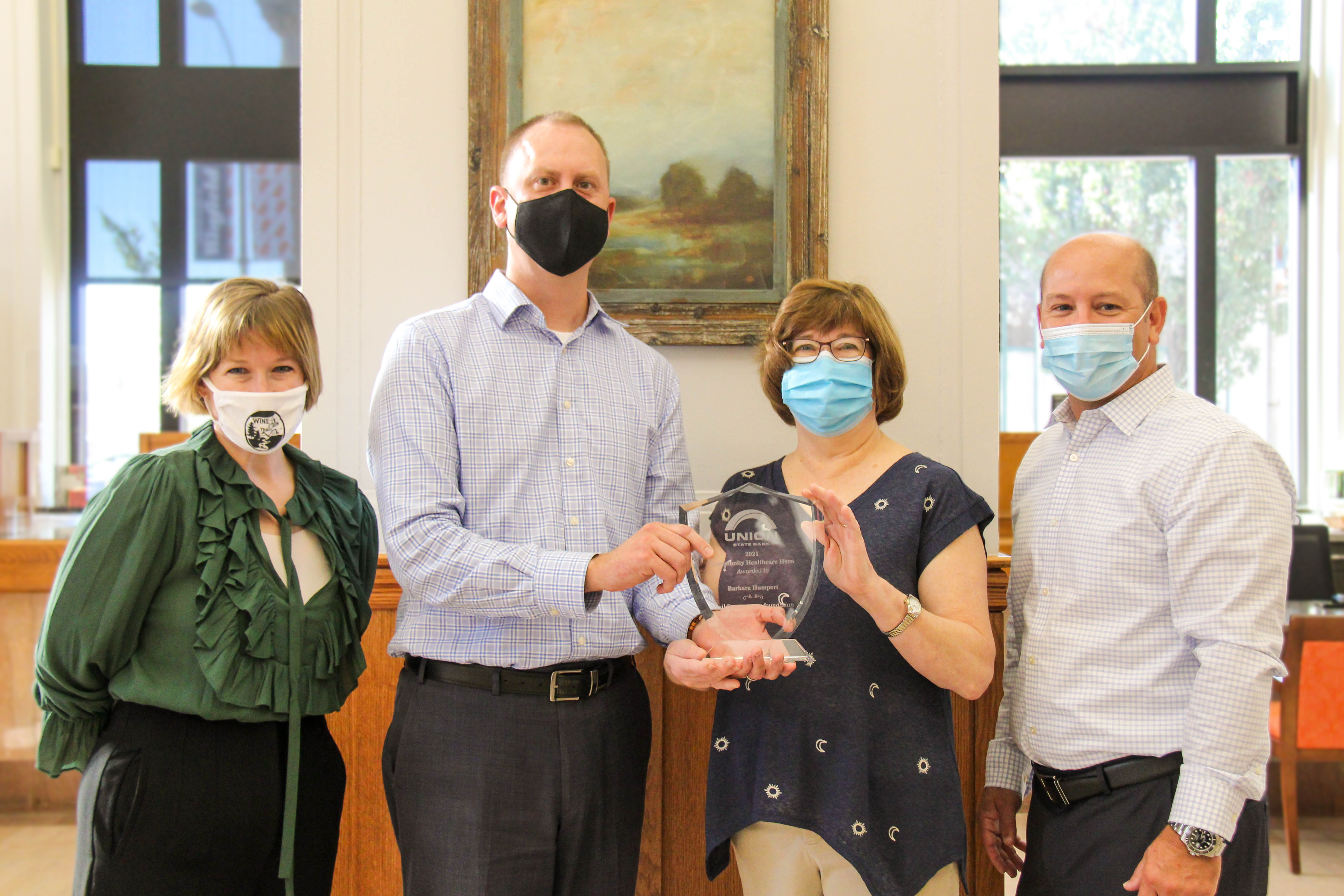 Long-time William Newton Hospital nurse Barbara Humpert, BSN, RN, CCRN, is the 2021 Union State Bank Healthcare Hero. From left: William Newton Healthcare Foundation Director Annika Morris, Union State Bank Winfield President Cory Helmer, Humpert, and Union State Bank President and CEO Eric Kurtz.