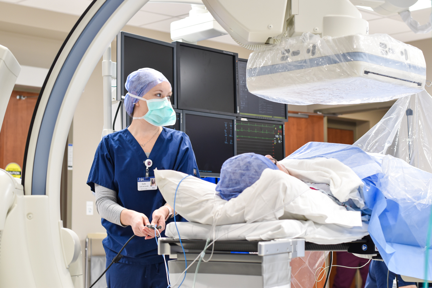 New William Newton Hospital Lead Cath Lab Nurse Kadie Chittick, BSN, RN, prepares for a heart catheterization procedure.