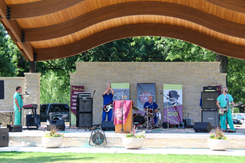 An ensemble of William Newton Hospital employees, physicians, and friends, dubbed The Scrubs, perform at the hospital’s Second Century Campaign celebration. From left is Stephen Butler, Dr. Daniel Miller, Mike Heaton, and Dr. Douglas Moore.