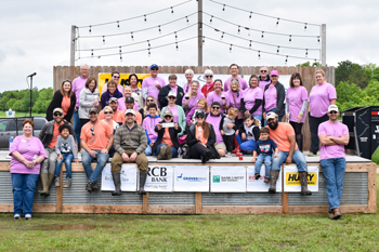 William Newton Healthcare Foundation and Wheat State Wine Co. staff and volunteers gather following the races on Saturday to celebrate a record-breaking year for this William Newton Hospital fundraiser.