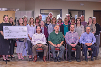 Front row from left: Mike Mildfelt, Kevin Lowe, Anthony Stonerock, and Dean Kennedy
Second row from left: Annika Morris of William Newton Healthcare Foundation, Amanda Conrad, Katherine Seeliger, Becky Groene, Mary Goodwin, Tami Cooley, Casey Moses, and Kaile Exley
Third row from left: Brittney Carson of William Newton Healthcare Foundation, Kathy Echols, Jenny Herlocker, Caterina Albers, Cathy Bowman, Anita Mitchell, Brian Dutton, and Jackie Snodgrass
Fourth row from left: Bruce Schwyhart of the William Newton Healthcare Foundation corporate committee, Mike Niederee, and Craig Duncan of Winfield Economic Development