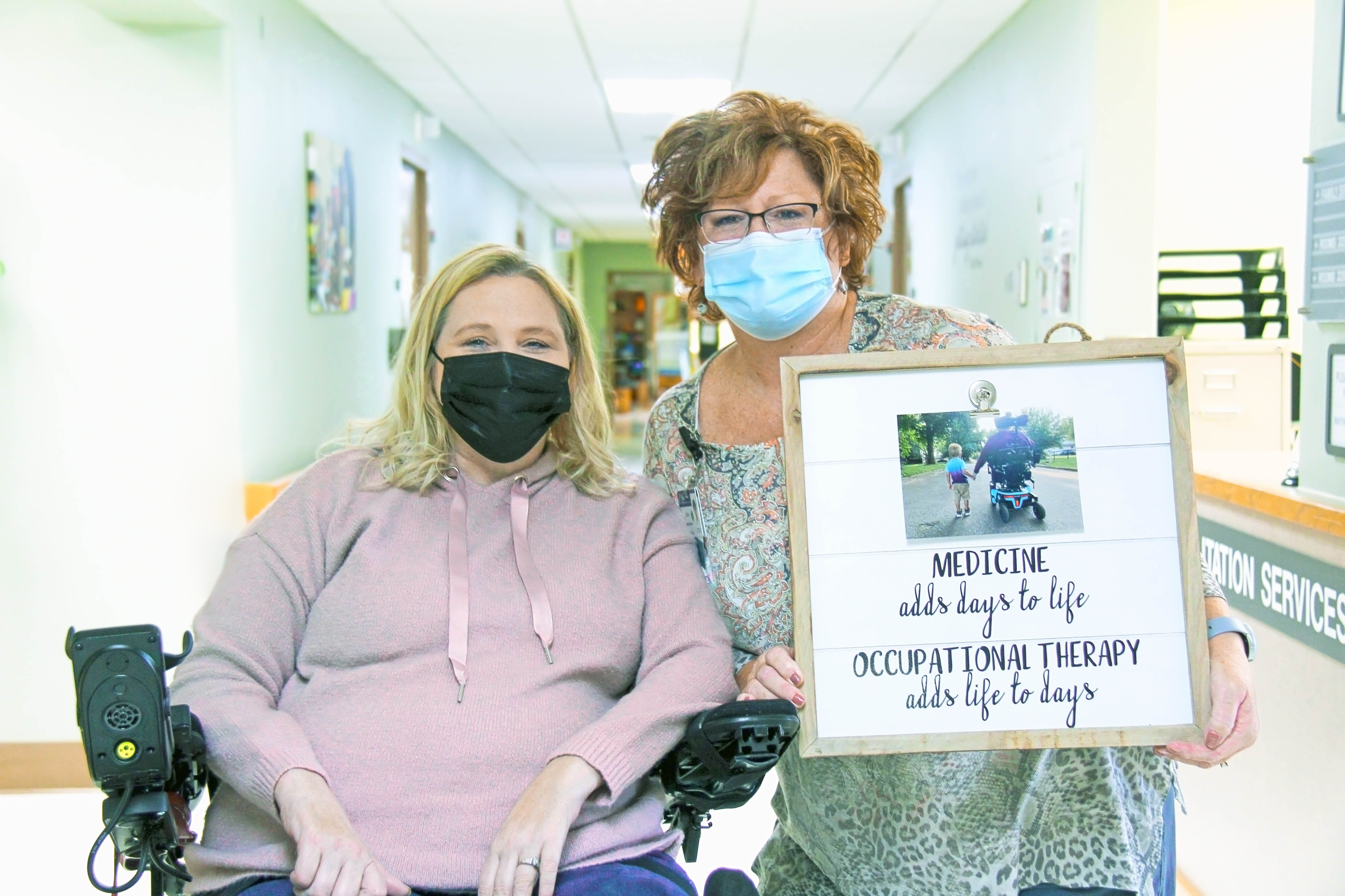 Traci with occupational therapist assistant Kathy Kiene.