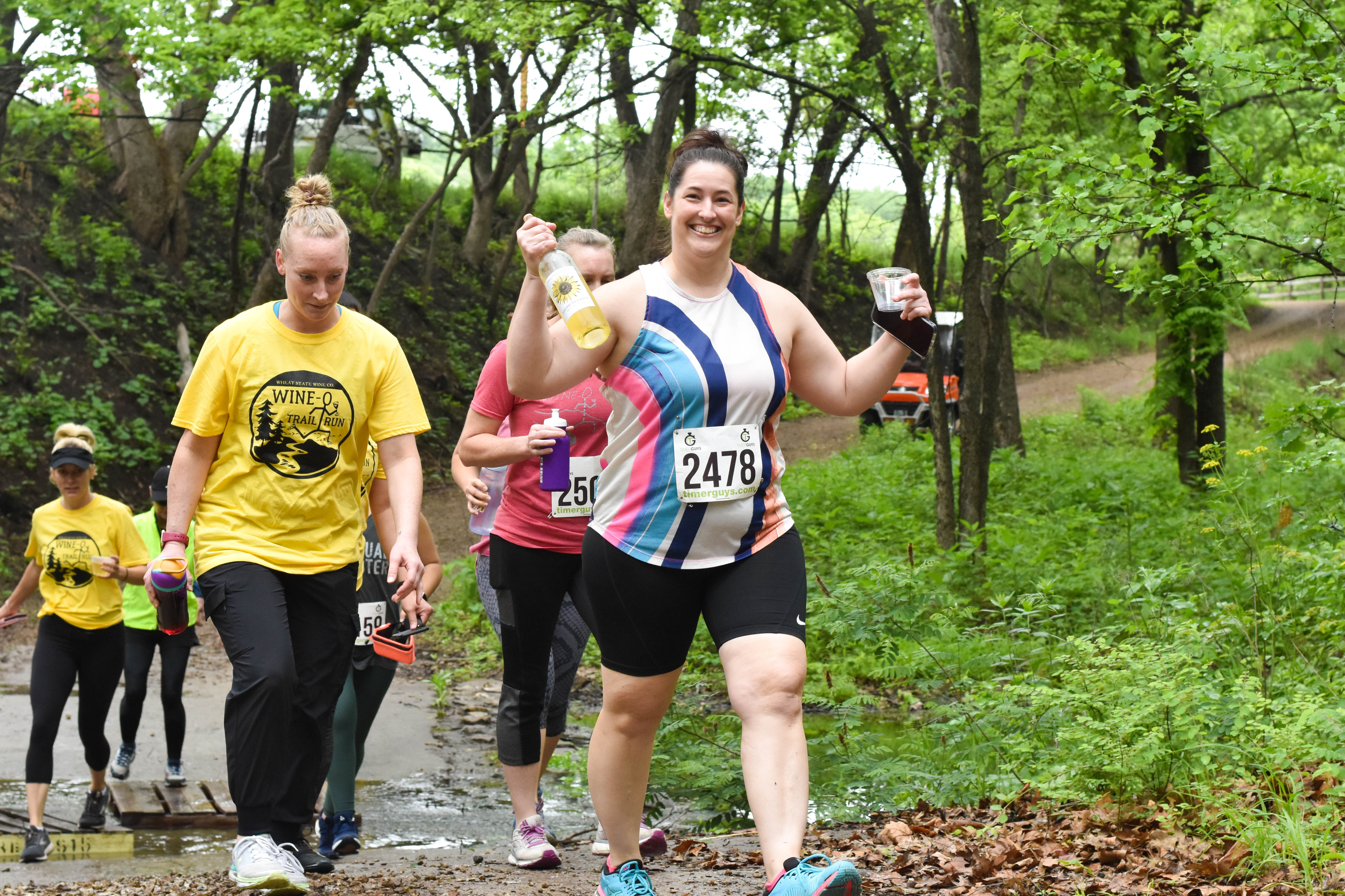 Participants traverse the trail at Wheat State Wine Co. in support of William Newton Hospital.