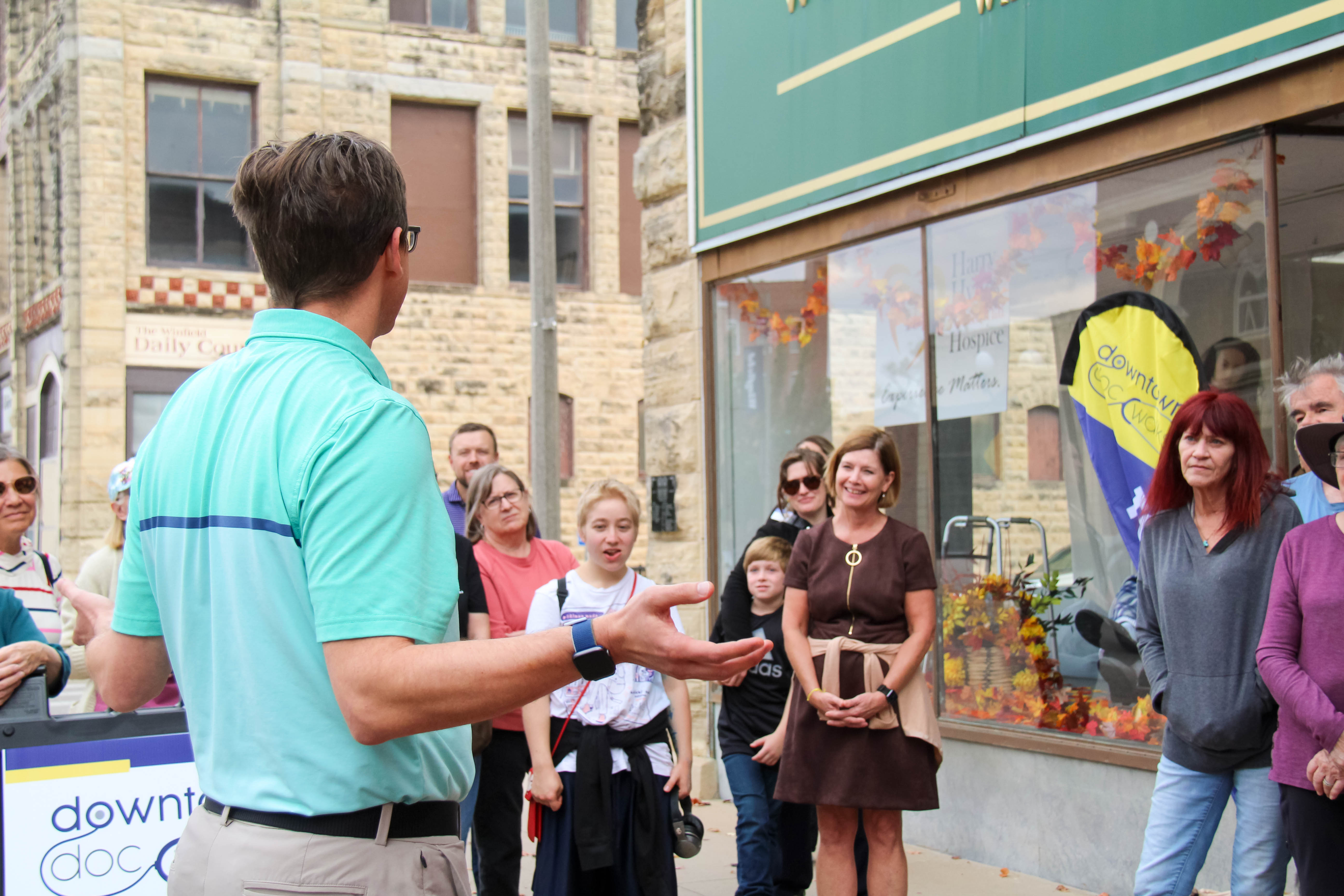 Dr. Todd Peters discusses ways to deal with stress with Downtown Doc Walks participants at the Winfield Area Chamber of Commerce.