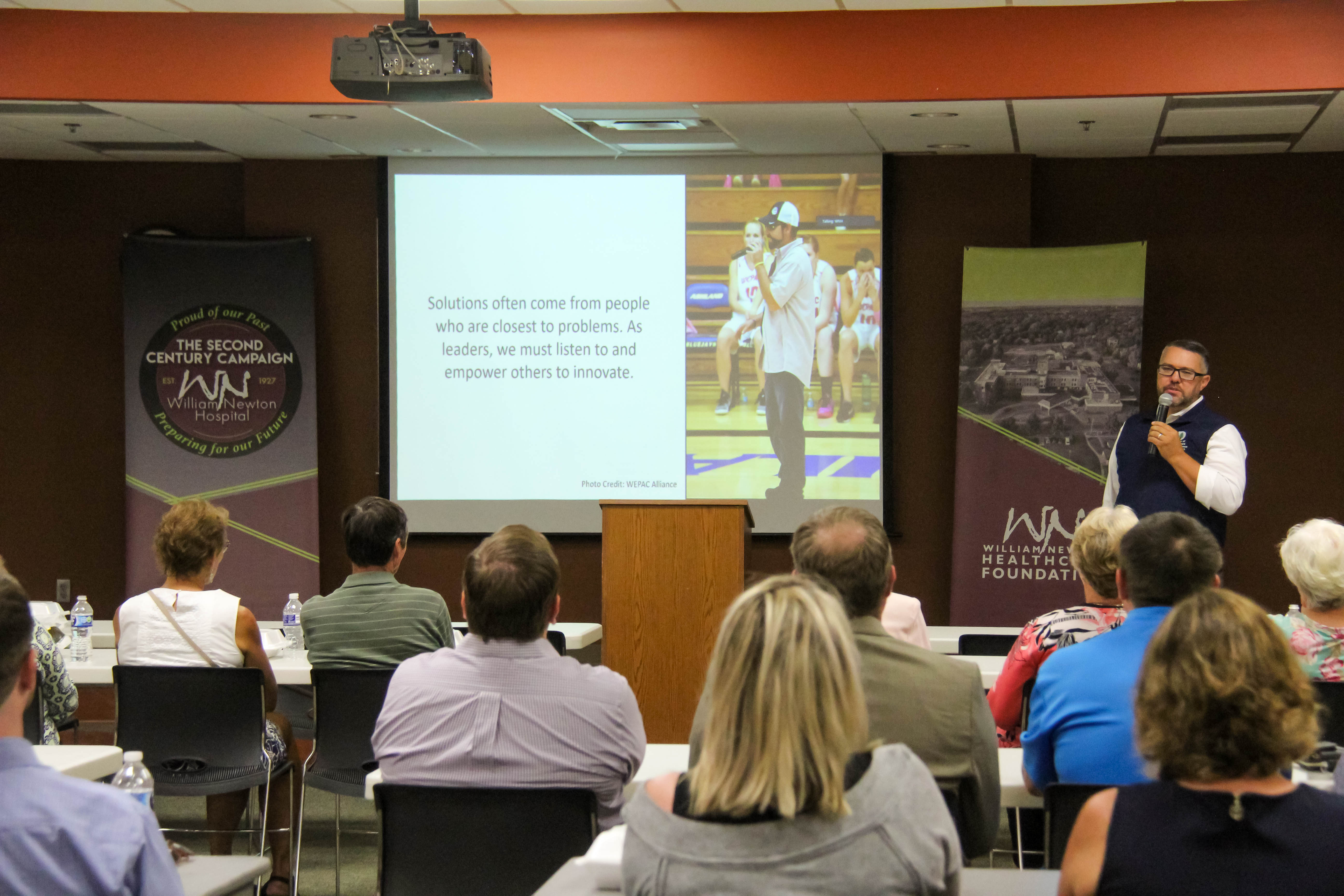 Former Kansas rural hospital CEO Ben Anderson addresses guests at the second session of the Radcliff Lecture Series on Rural Health at the Physicians Pavilion in Winfield.