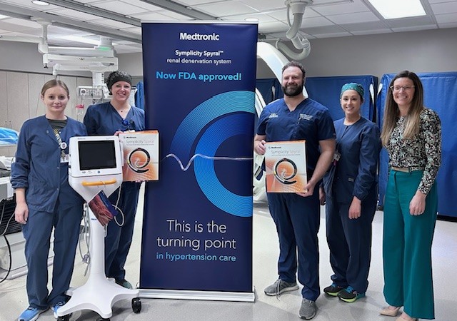 William Newton Hospital team members show off the new Symplicity Spyral™ renal denervation (RDN) system following the first successful blood pressure treatment in March 2025. From left Kadie Chittick, RN, Sarah Cooper, RTR, Ryan Beard, MD, Rebecka Tebben, RTR, and Amber Seitzinger, MHA, OTR/L, FACHE.