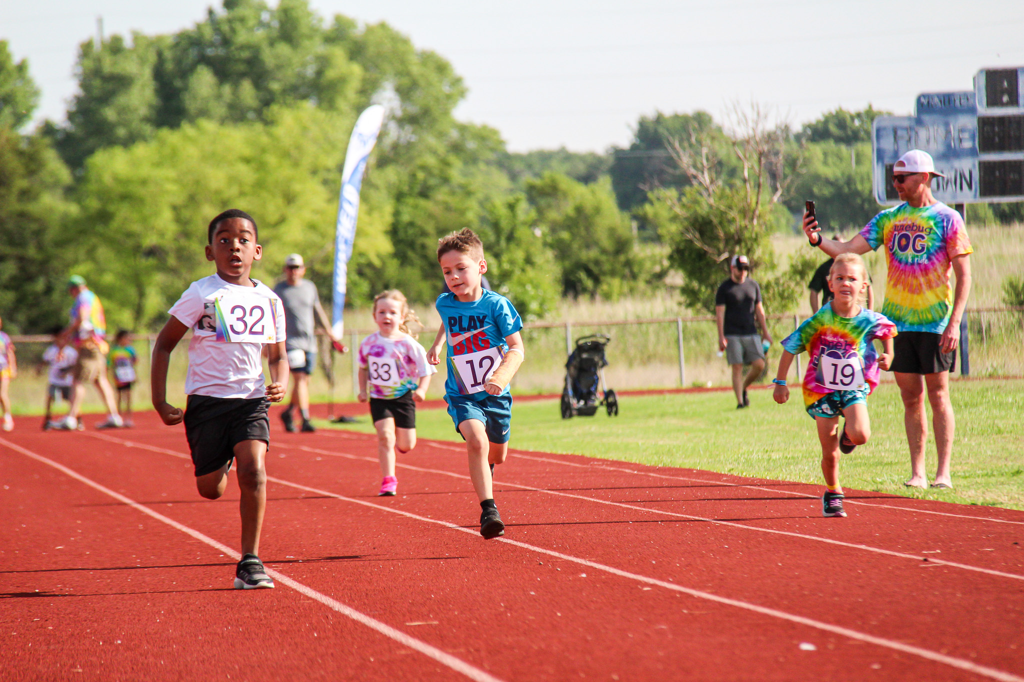 A heat of junior Junebug dashers sprints towards the finish at the Joe Vann track in Winfield.